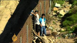 Migrant families divided at Mexican border [upl. by Lirpa]