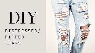 HOW TO  DIY Distressed  Ripped Jeans Tutorial [upl. by Cammy]